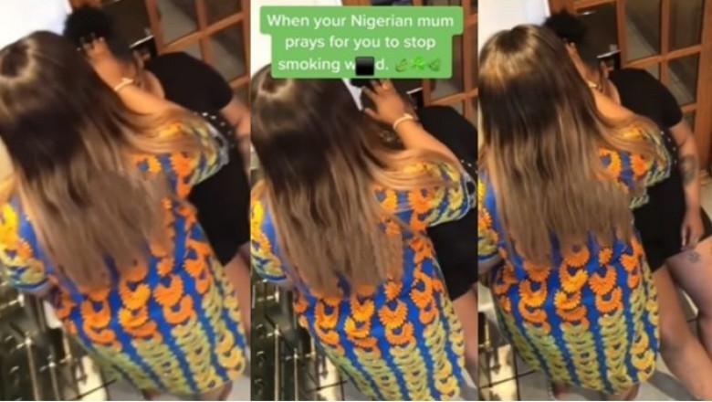 Nigerian mum places hand on her daughter and prays for her to stop smoking weed (Watch video)