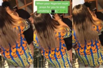Nigerian mum places hand on her daughter and prays for her to stop smoking weed (Watch video)